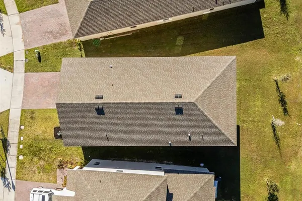 a view of a balcony with chairs