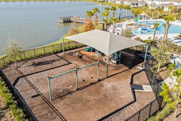 a view of a patio with swimming pool