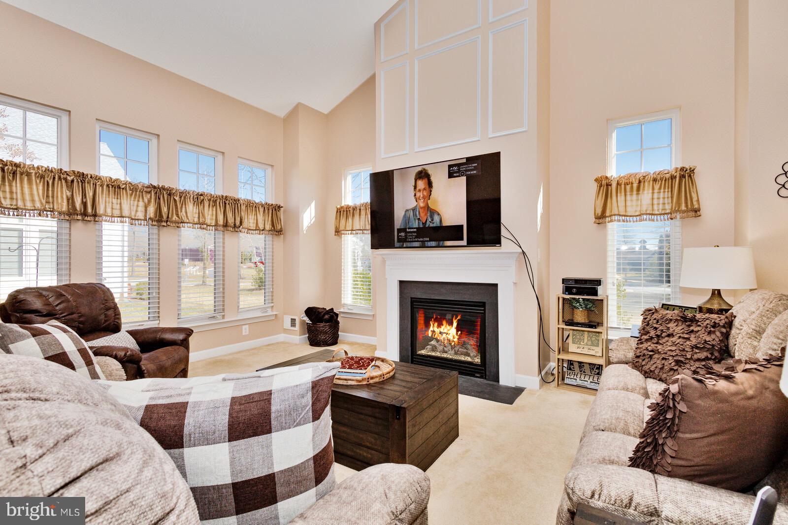 7224 Ivy Bank Road Laurel, MD 20707 - Photo 12 of 37 FAMILY ROOM FEATURES WARM GAS FIREPLACE