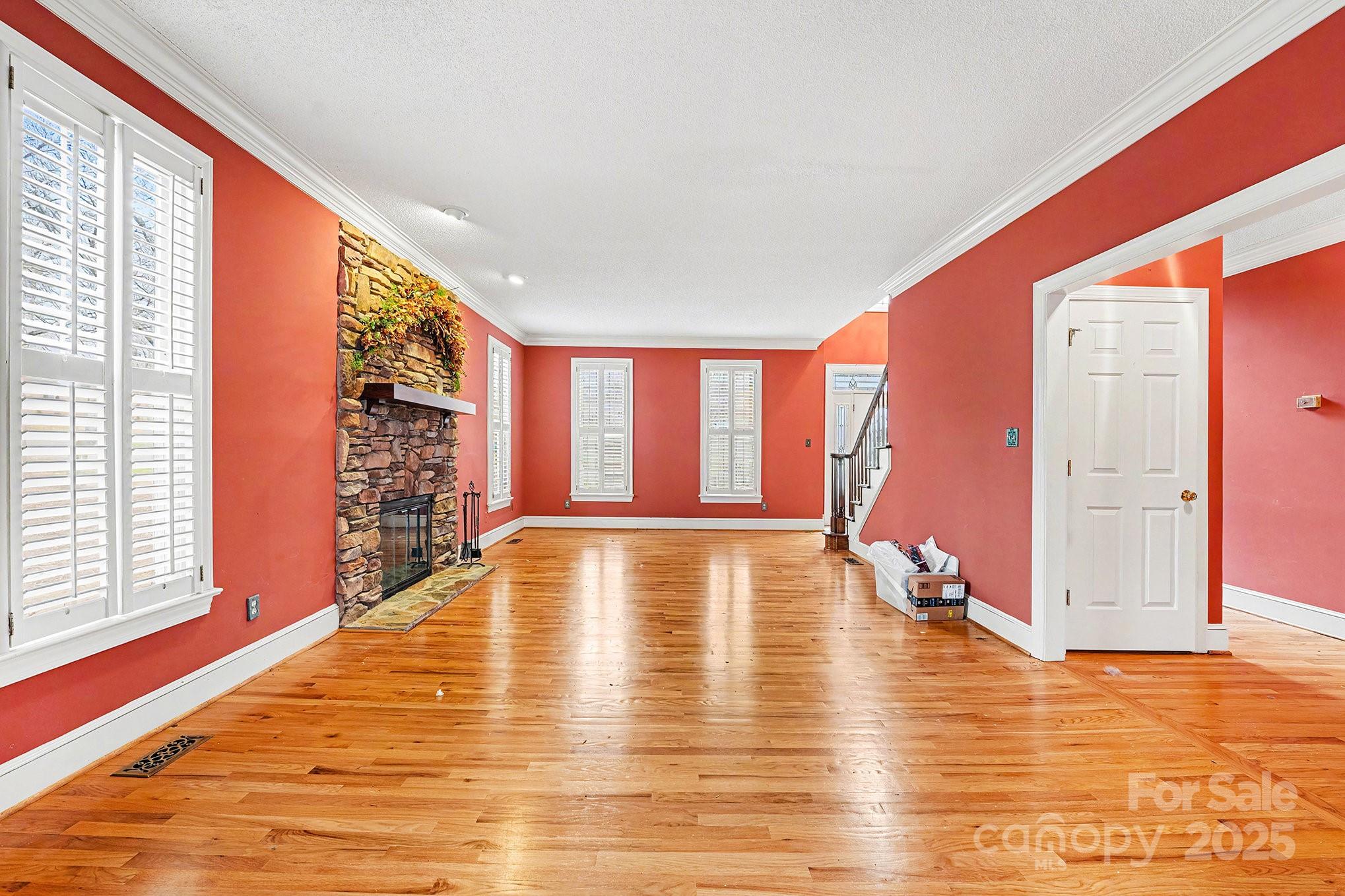 217 Nottingham Drive Huntersville, NC 28078 - Photo 11 of 41 a view of empty room with wooden floor and floor