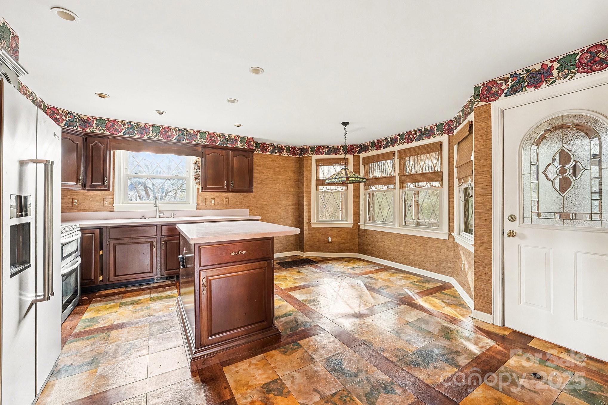 217 Nottingham Drive Huntersville, NC 28078 - Photo 18 of 41 a spacious bathroom with a sink a mirror and next to a window