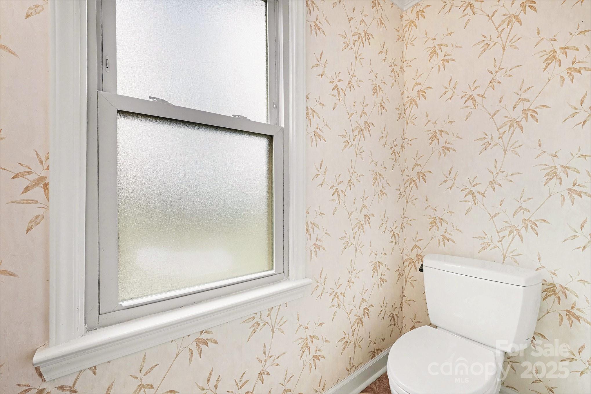 217 Nottingham Drive Huntersville, NC 28078 - Photo 27 of 41 a white toilet sitting next to a shower