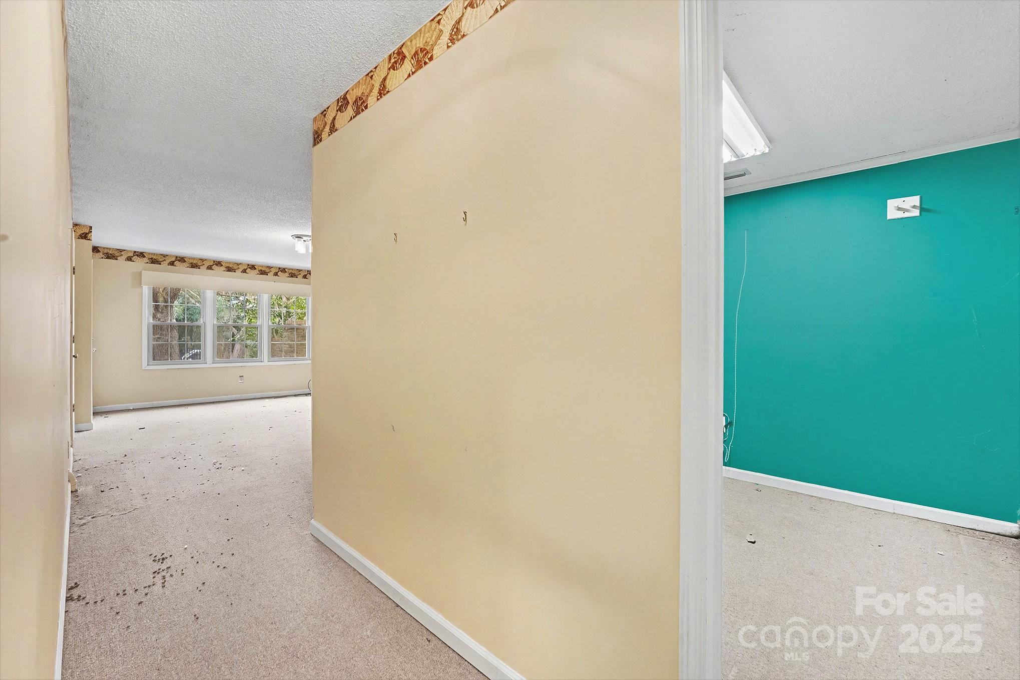 217 Nottingham Drive Huntersville, NC 28078 - Photo 29 of 41 a view of an empty room