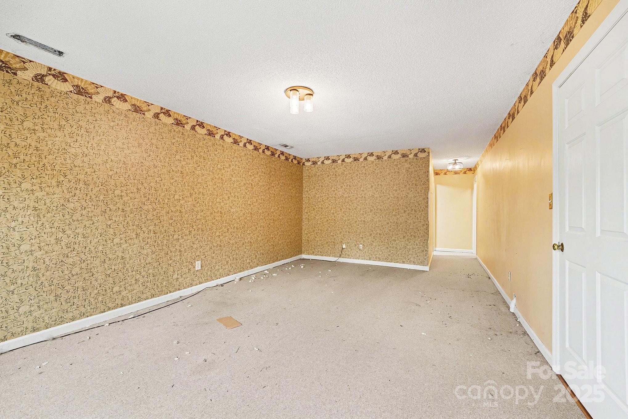 217 Nottingham Drive Huntersville, NC 28078 - Photo 33 of 41 a view of an empty room