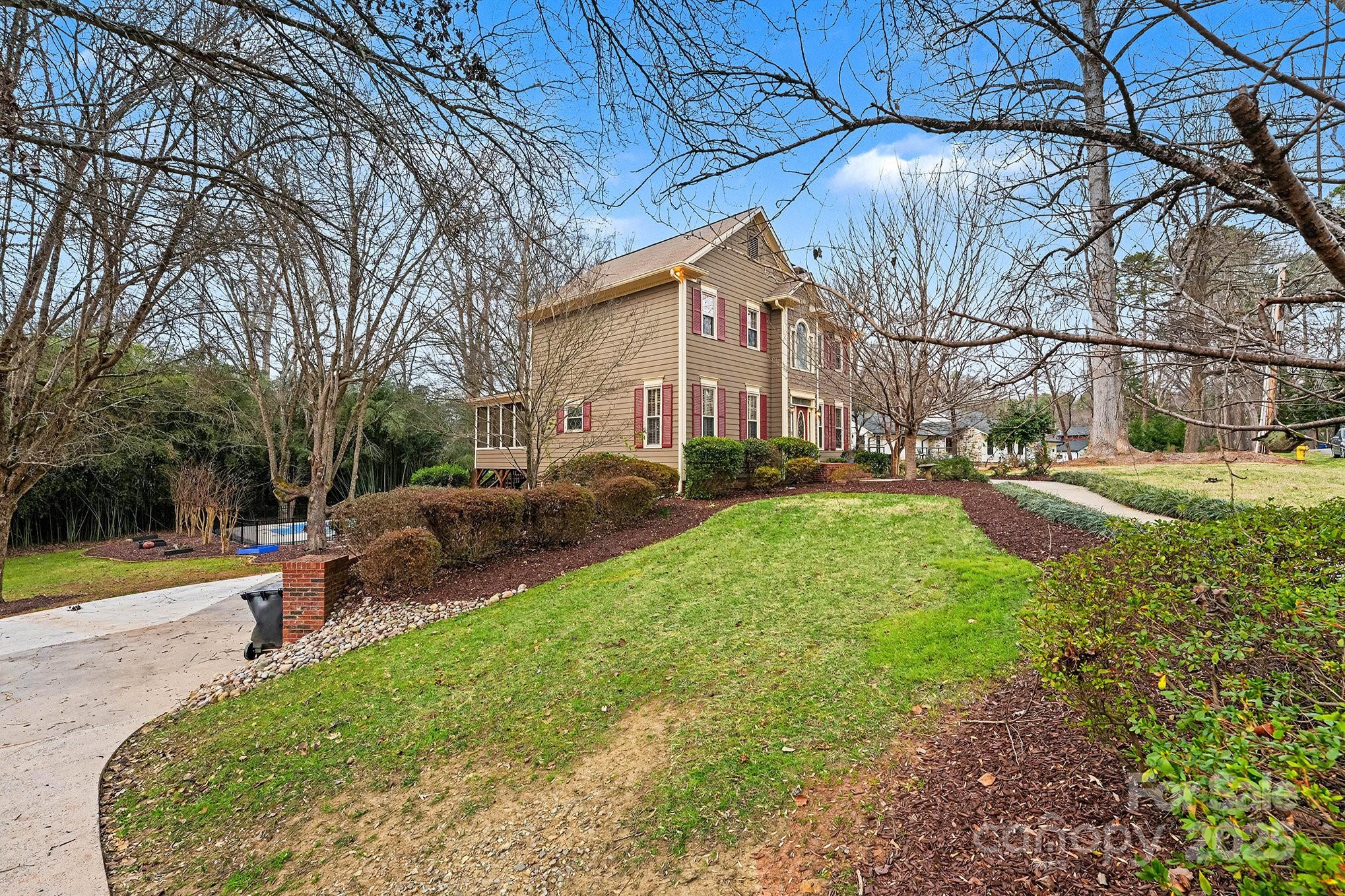 217 Nottingham Drive Huntersville, NC 28078 - Photo 7 of 41 a view of a backyard with a garden and plants