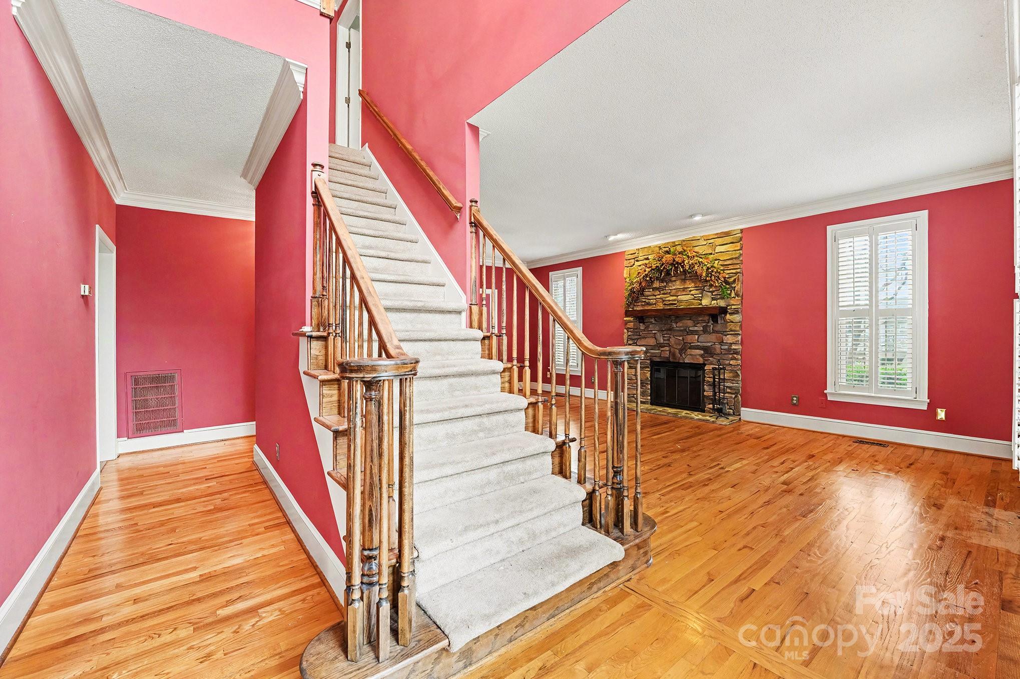217 Nottingham Drive Huntersville, NC 28078 - Photo 10 of 41 a view of entryway and hall with wooden floor