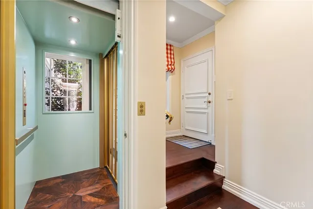 a bedroom with a bed furniture and a window