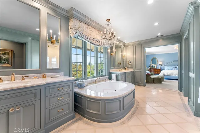 a view of a patio with a table and chairs under an umbrella