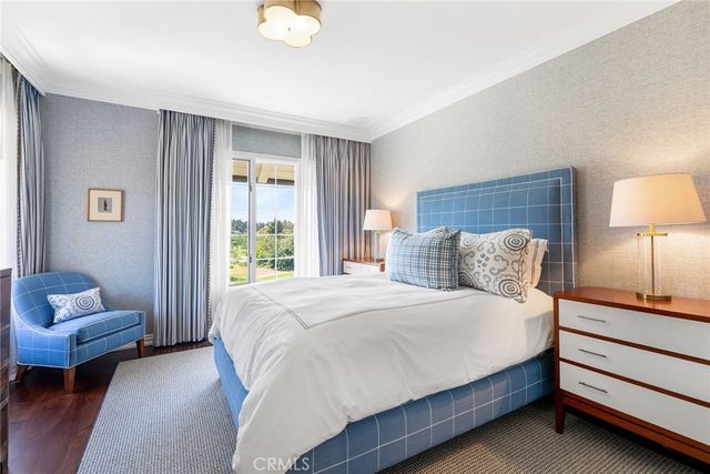 a view of a lake with a house in the background