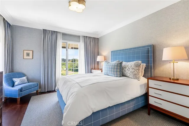 a view of a lake with a house in the background