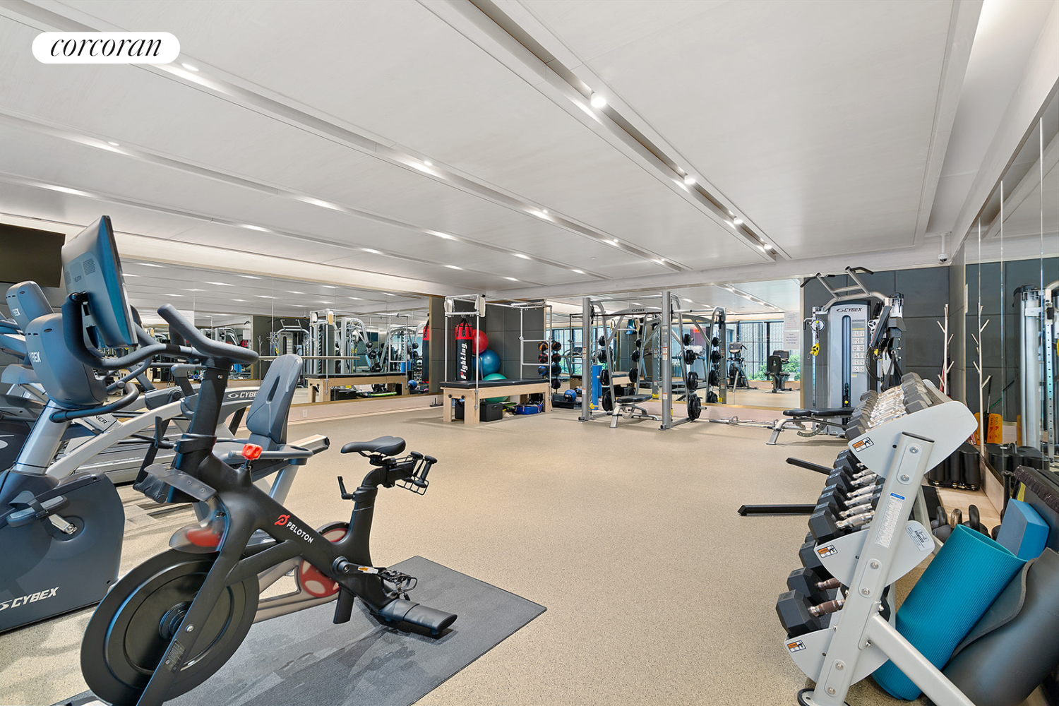 60 East 86th Street, Unit 16 Manhattan, NY 10028 - Photo 10 of 12 a view of a room with gym equipment