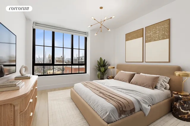 a dining room with furniture and a large window