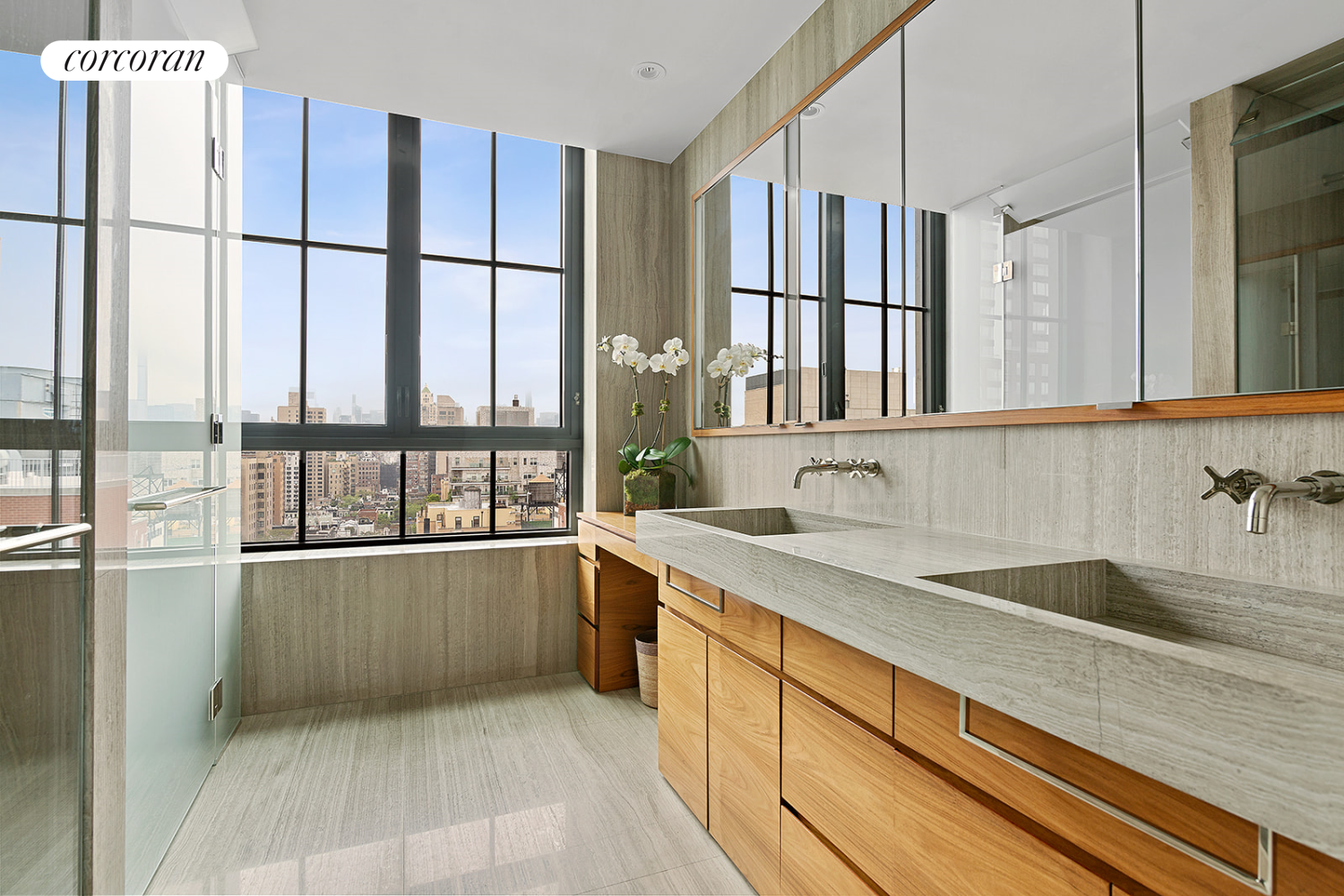 60 East 86th Street, Unit 16 Manhattan, NY 10028 - Photo 4 of 12 a kitchen with stainless steel appliances granite countertop a sink and a large window