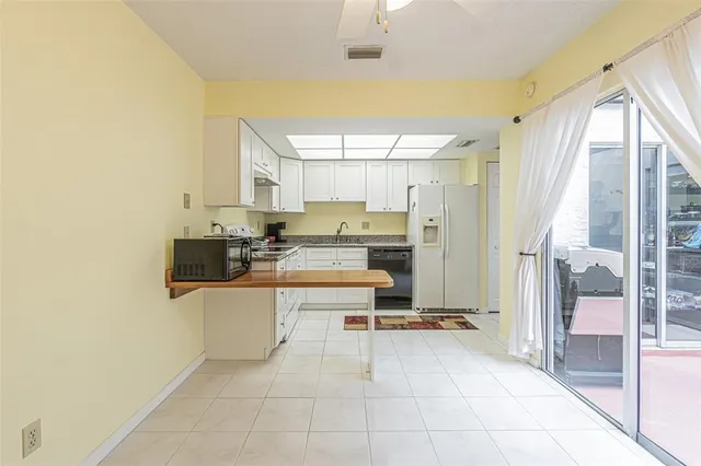 $229,000 | 1130 Orange Tree Circle West, Unit C, Palm Harbor, FL 34684