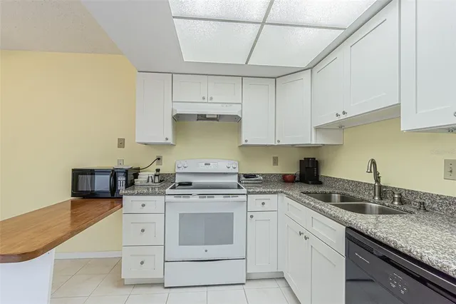 $229,000 | 1130 Orange Tree Circle West, Unit C, Palm Harbor, FL 34684