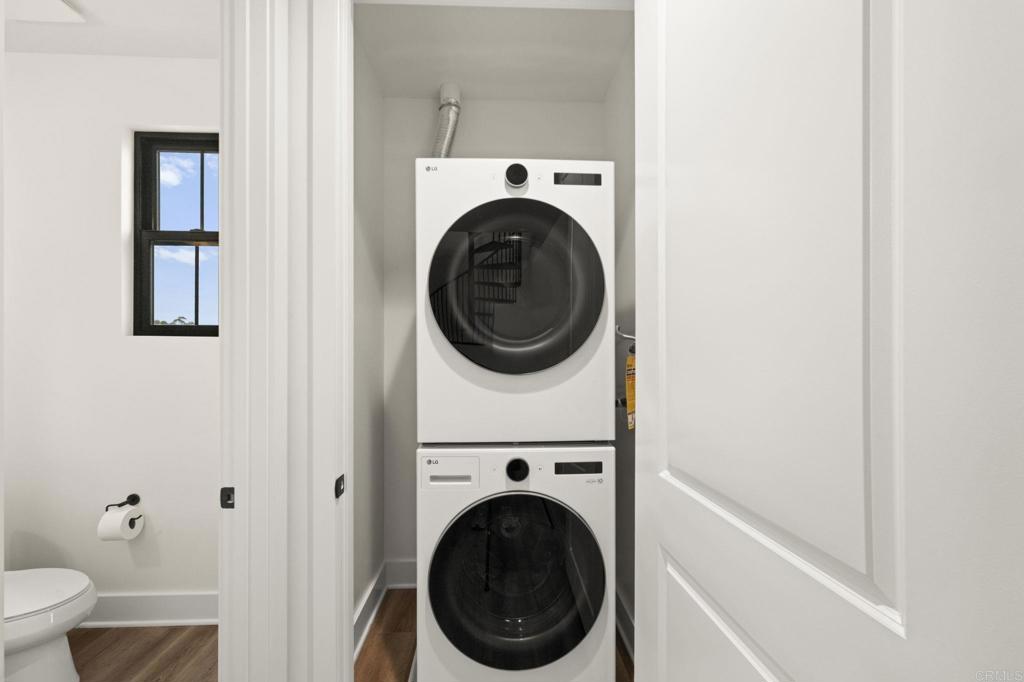 1303 Bergamo, Unit 201 Encinitas, CA 92024 - Photo 17 of 42 a utility room with dryer and washer
