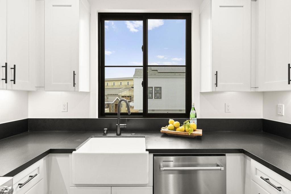 1303 Bergamo, Unit 201 Encinitas, CA 92024 - Photo 20 of 42 a kitchen with a sink and a window