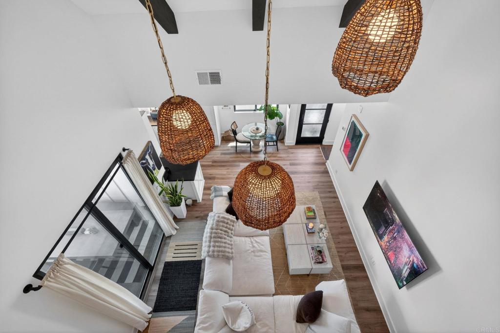 1303 Bergamo, Unit 201 Encinitas, CA 92024 - Photo 2 of 42 a view of living room with furniture and a mirror