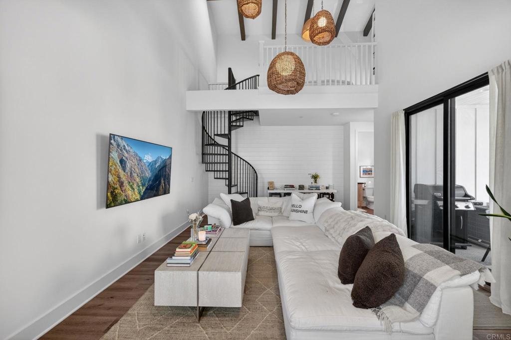 1303 Bergamo, Unit 201 Encinitas, CA 92024 - Photo 32 of 42 a living room with furniture and a window