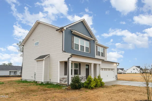 a view of a house with a patio