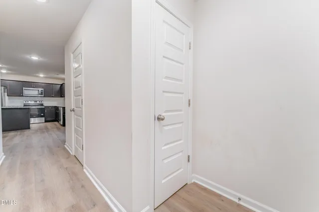 a view of kitchen and wooden floor