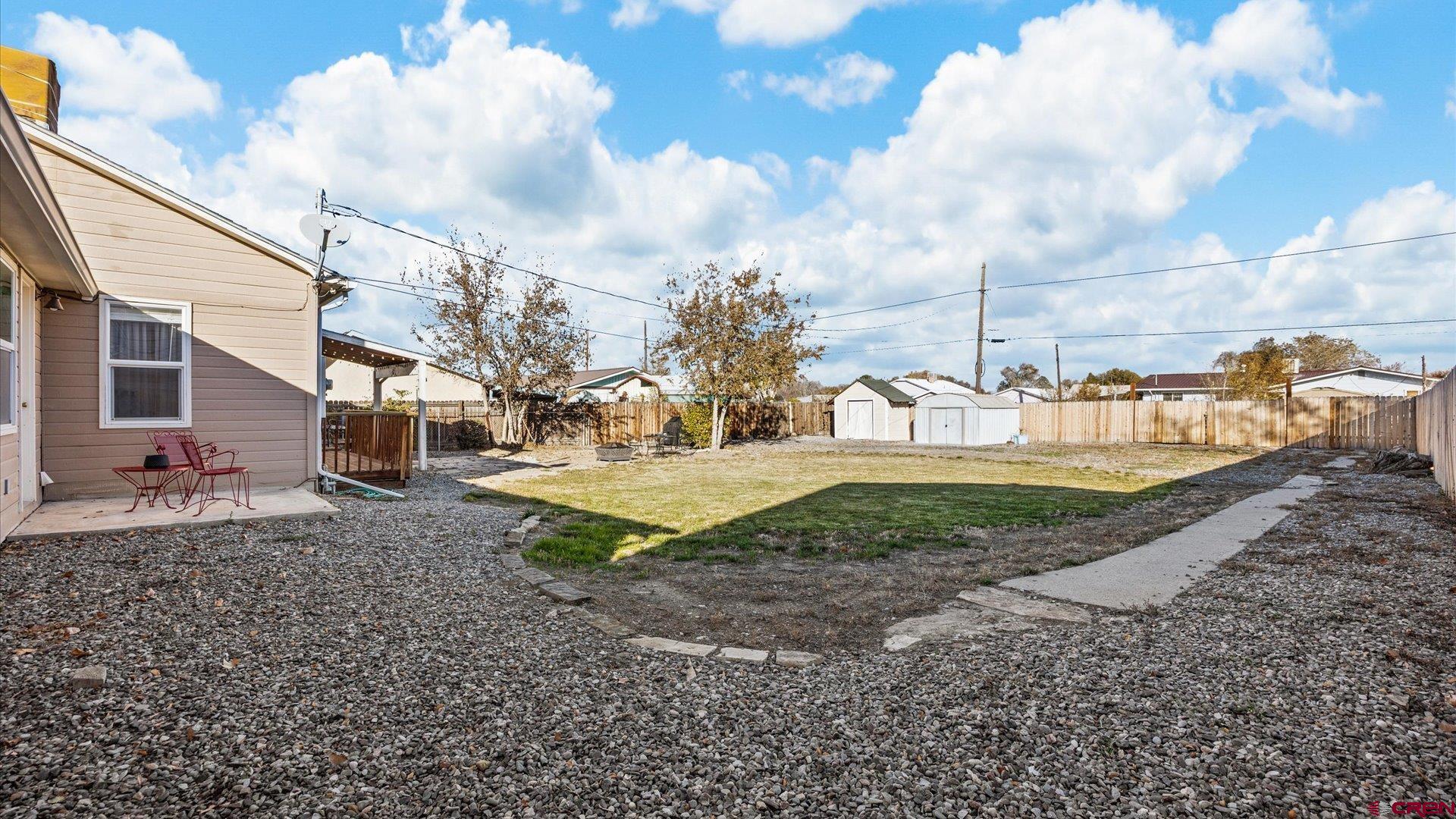 522 Leon Street Delta, CO 81416 - Photo 11 of 33 a view of a backyard with sitting area