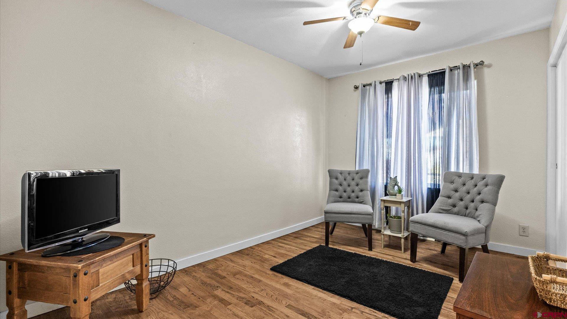 522 Leon Street Delta, CO 81416 - Photo 14 of 33 a workspace with furniture and a window