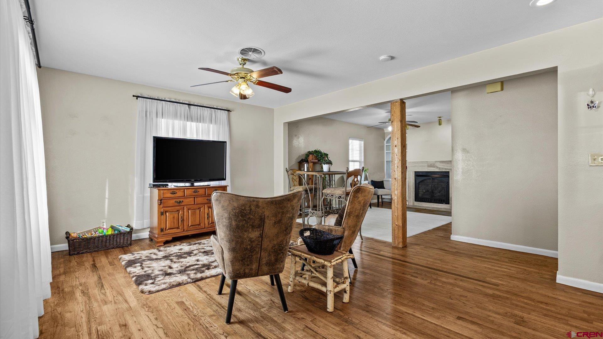 522 Leon Street Delta, CO 81416 - Photo 18 of 33 a view of a dining room with furniture and wooden floor