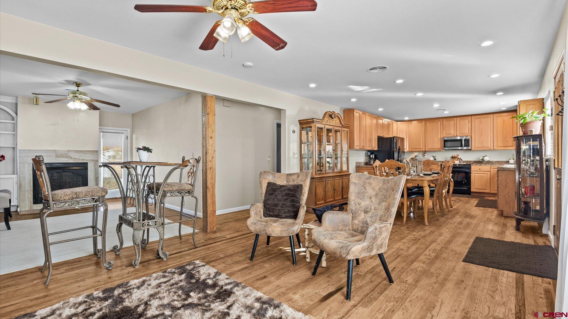 522 Leon Street Delta, CO 81416 - Photo 5 of 33 a view of a dining room with furniture and a wooden floor