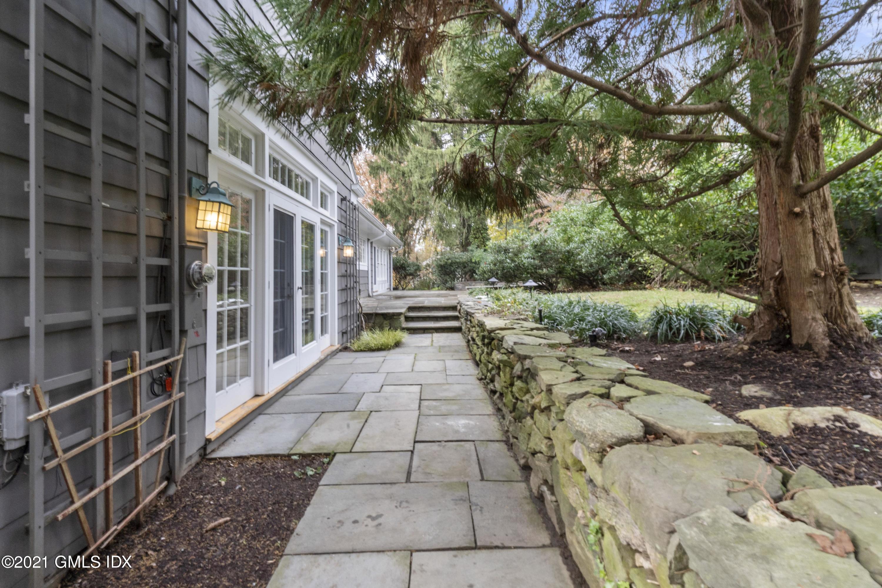 42 Indian Head Road Riverside, CT 06878 - Photo 33 of 47 a view of a pathway with a yard