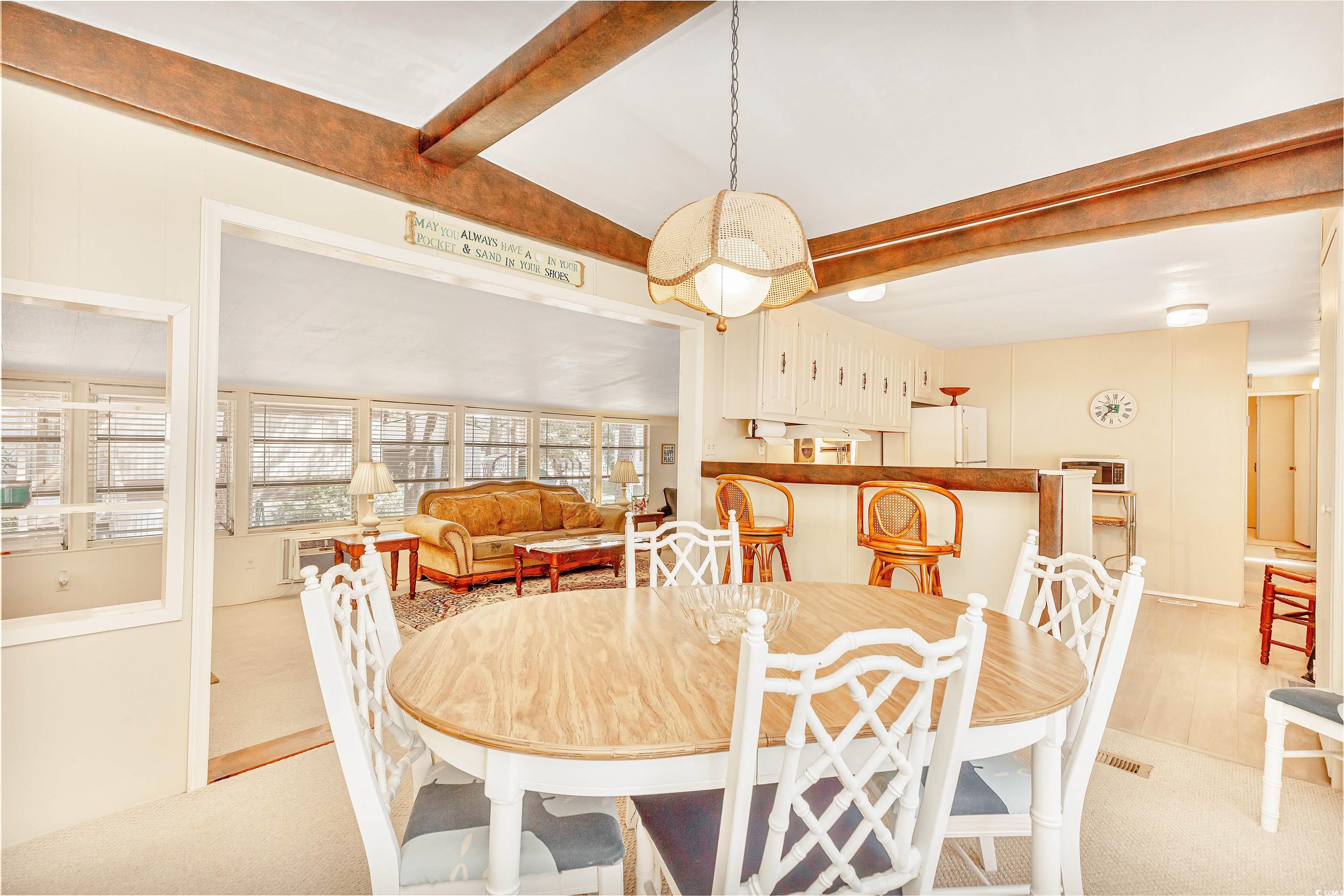 413 Delton Drive Murrells Inlet, SC 29576 - Photo 16 of 34 Dining space with beam ceiling