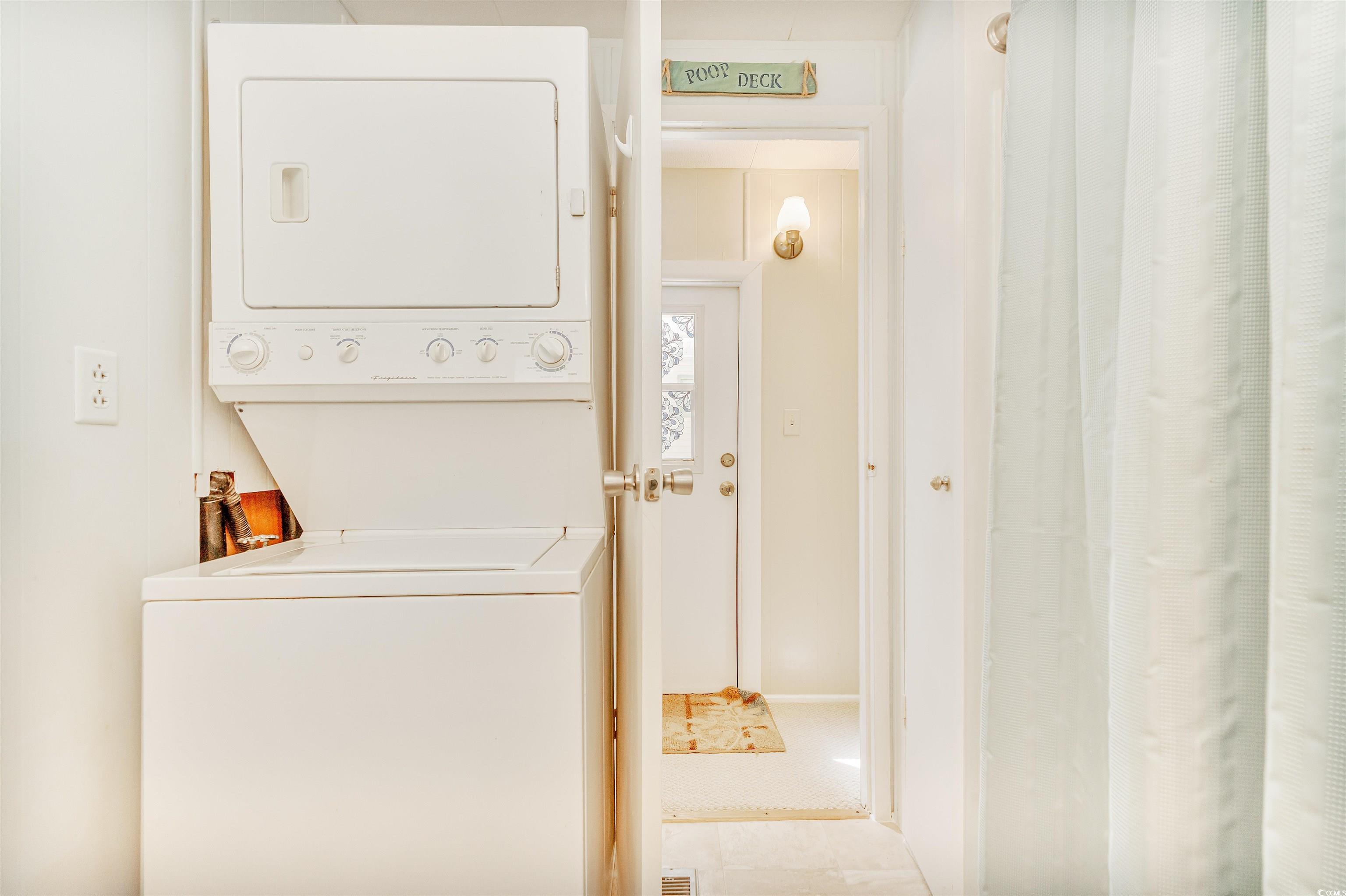 413 Delton Drive Murrells Inlet, SC 29576 - Photo 20 of 34 Washroom with stacked washer and dryer