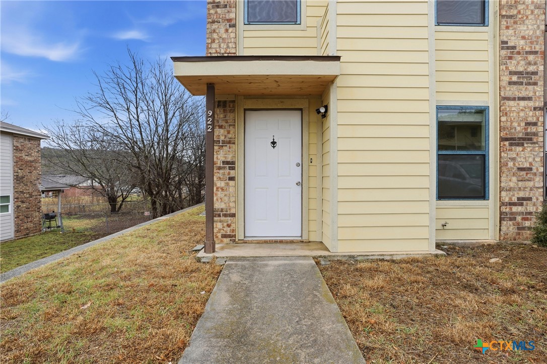 922 North 7th Street Copperas Cove, TX 76522 - Photo 3 of 26 a view of a house with backyard and trees