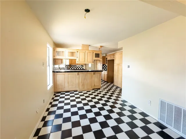 a black and white checkered floor with a black white checkered floor