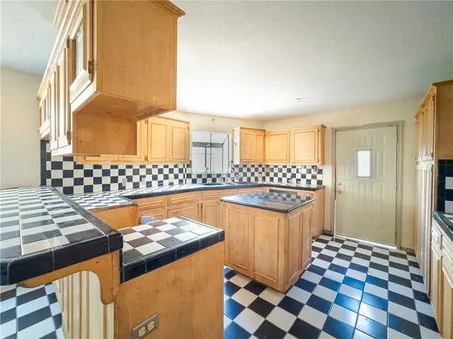 a bathroom with a sink a bathtub and a shower