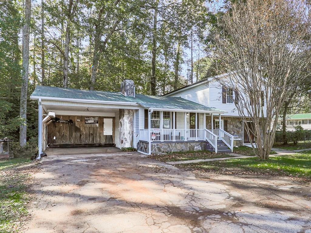 87 Jones Street Jasper, GA 30143 - Photo 24 of 25 a front view of a house with a yard