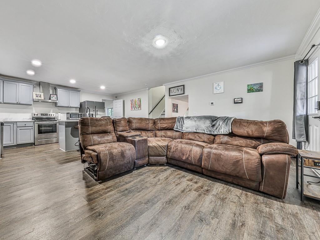 87 Jones Street Jasper, GA 30143 - Photo 8 of 25 a living room with furniture and kitchen view