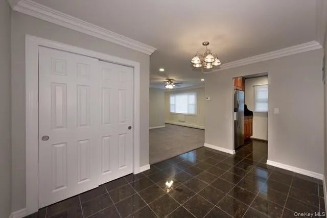 wooden floor in an empty room and a mirror