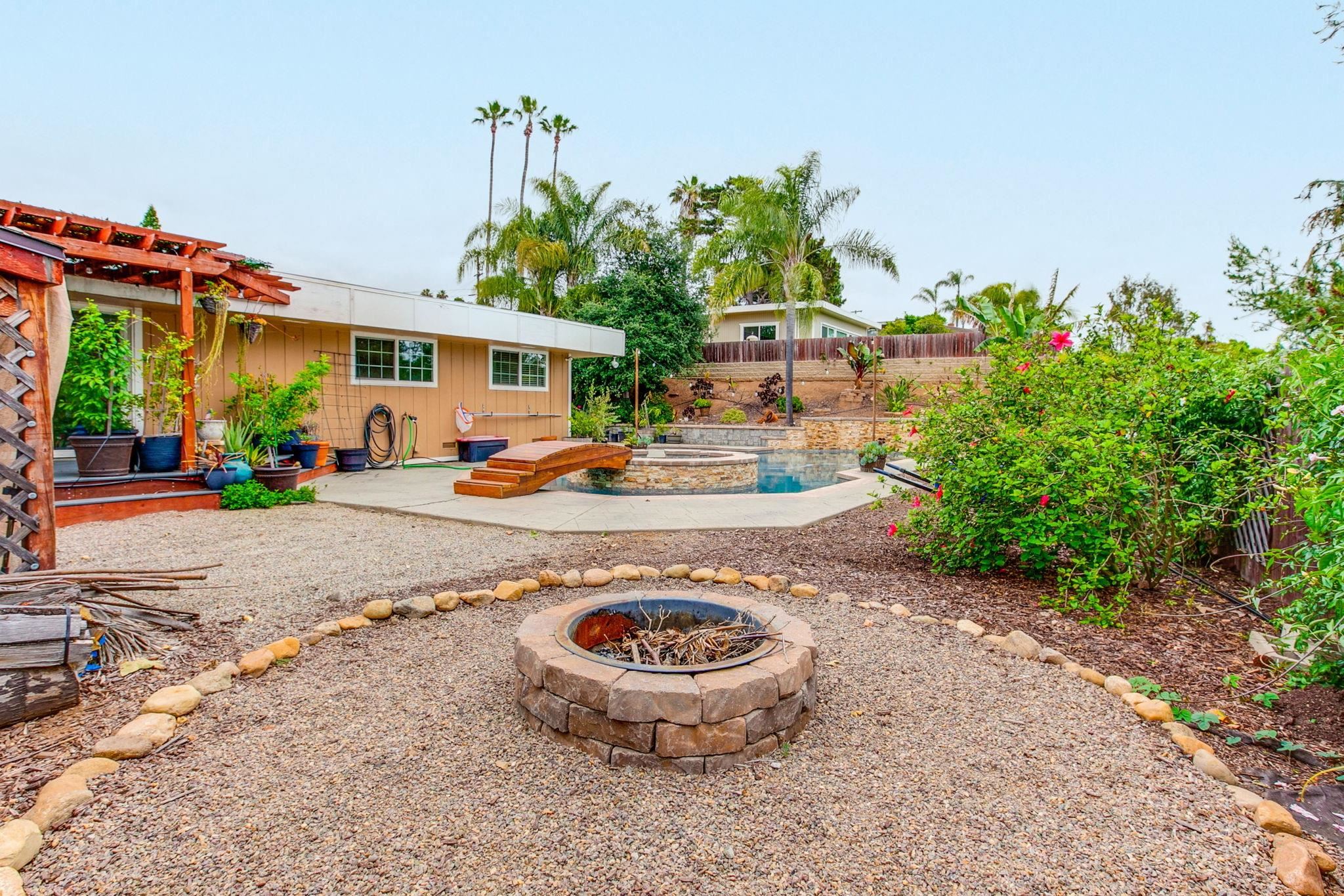 209 Casper Lane Vista, CA 92084 - Photo 12 of 12 a view of a backyard with plants and a patio