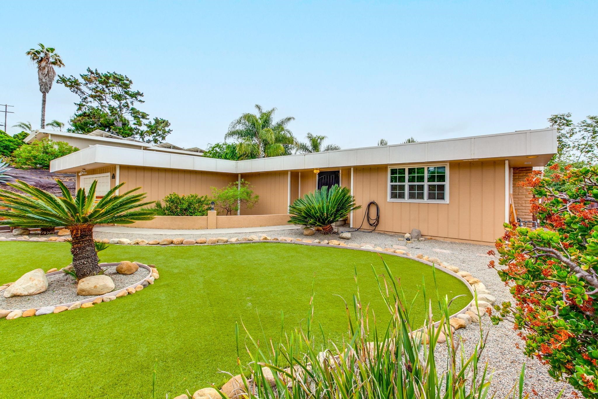 209 Casper Lane Vista, CA 92084 - Photo 2 of 12 a view of a house with pool and a yard