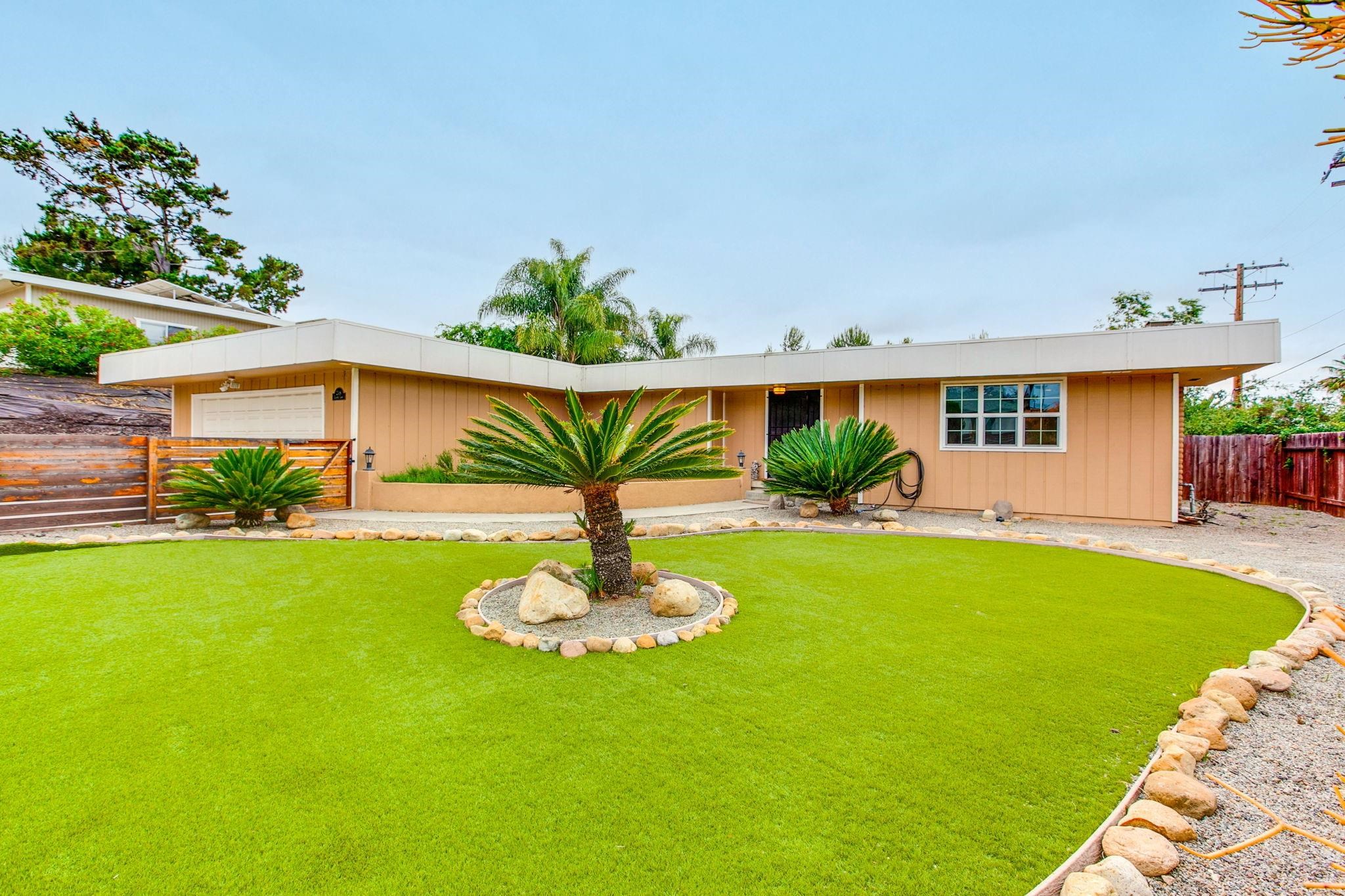 209 Casper Lane Vista, CA 92084 - Photo 4 of 12 a swimming pool with outdoor seating and yard