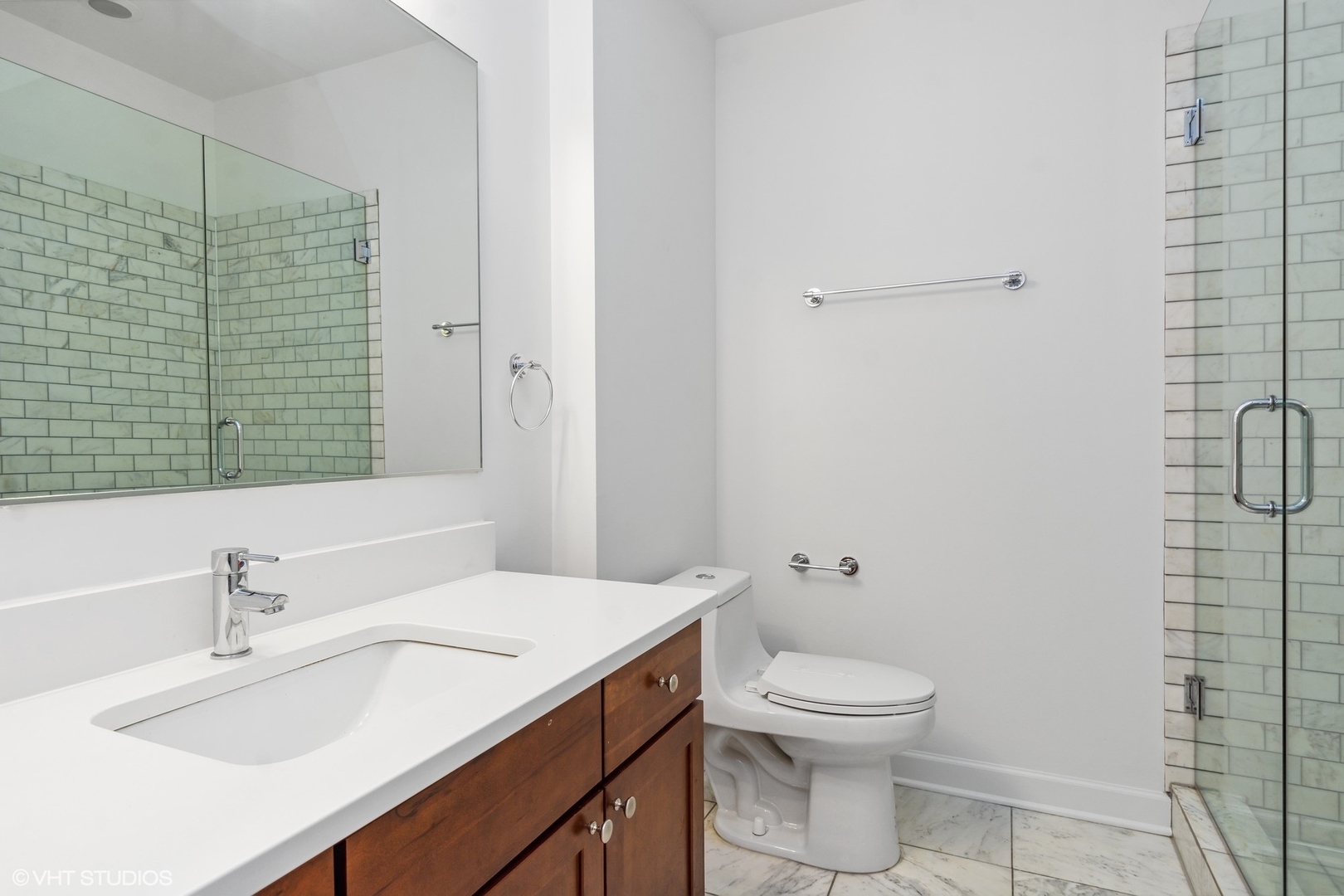 2130 West Rice Street, Unit 3 Chicago, IL 60622 - Photo 16 of 18 a bathroom with a sink toilet and shower