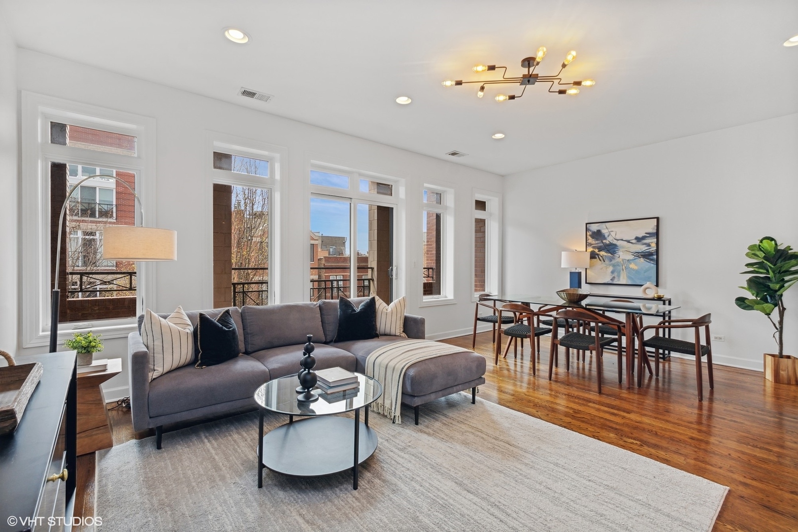 2130 West Rice Street, Unit 3 Chicago, IL 60622 - Photo 4 of 18 a living room with furniture and wooden floor
