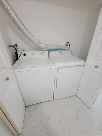 an empty room with a staircase