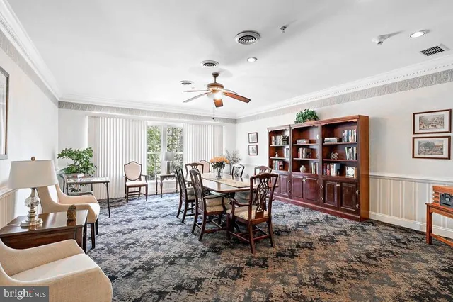 a view of a dining room with furniture