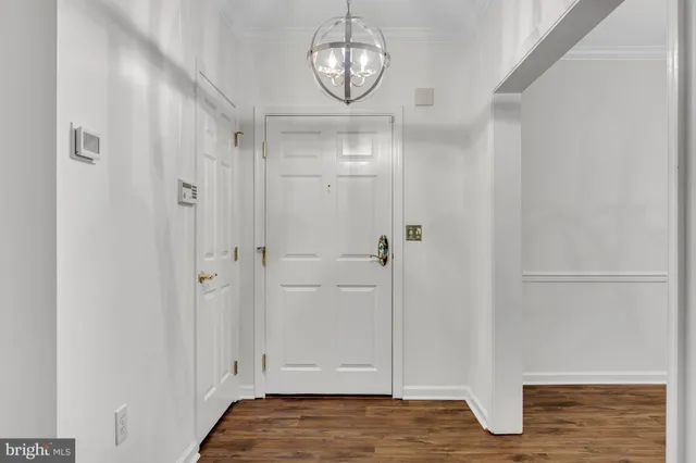 a view of room with wooden floor