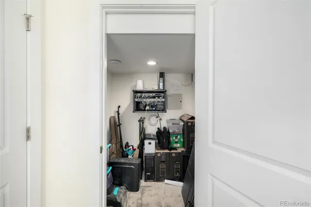 a kitchen with a refrigerator and a stove