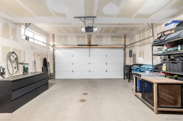 a kitchen with stainless steel appliances granite countertop a stove and cabinets