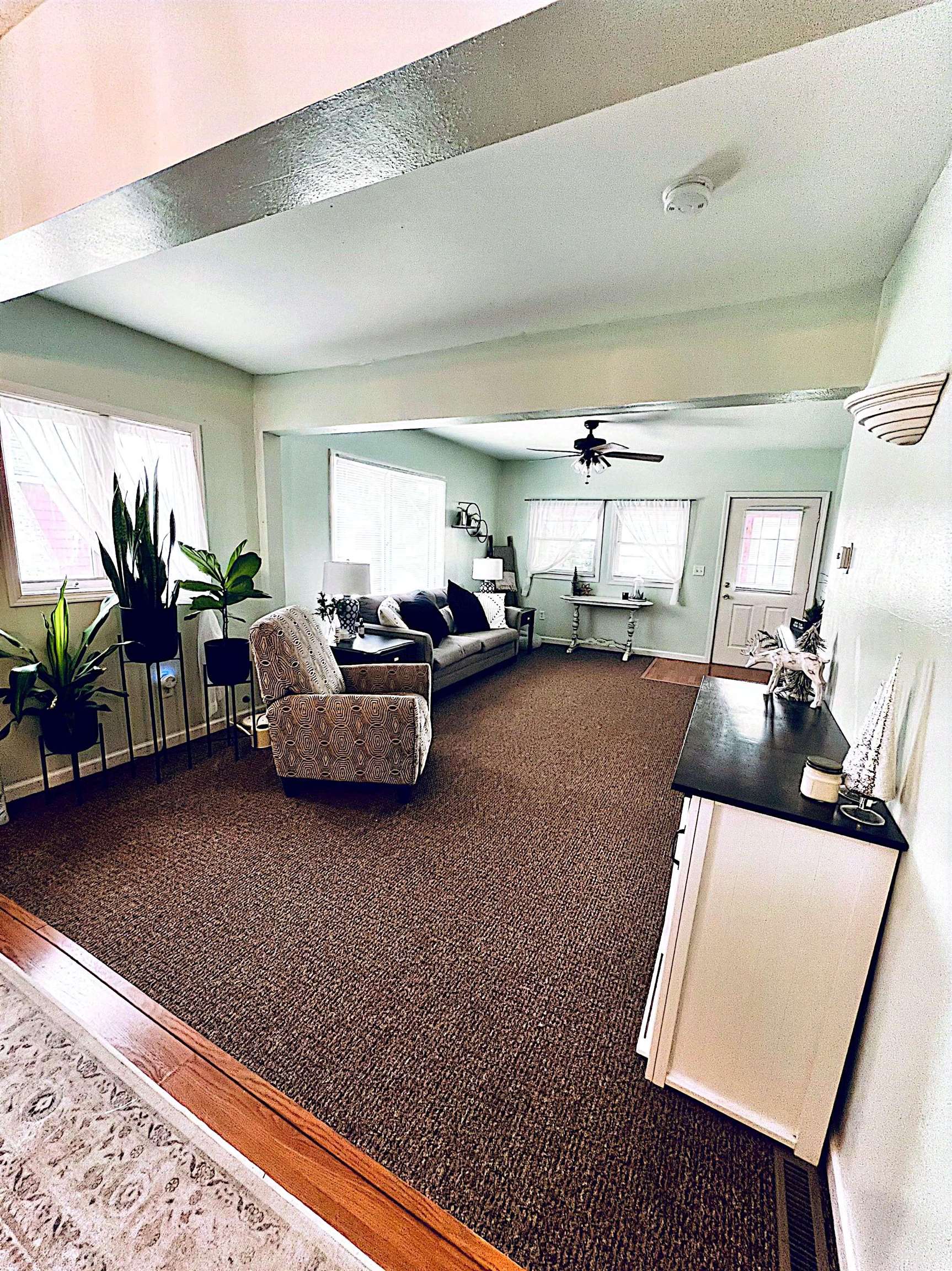 521 North Walnut Street Byron, IL 61010 - Photo 8 of 9 a living room with furniture and a rug