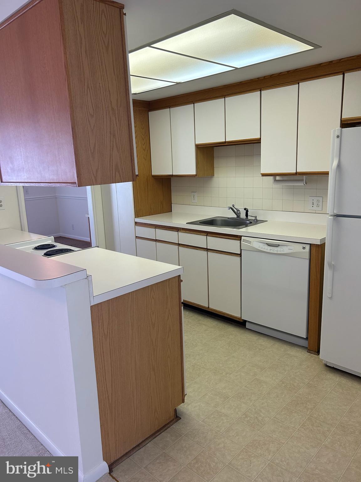 3669 Edelmar Terrace, Unit 117A Silver Spring, MD 20906 - Photo 12 of 28 Kitchen